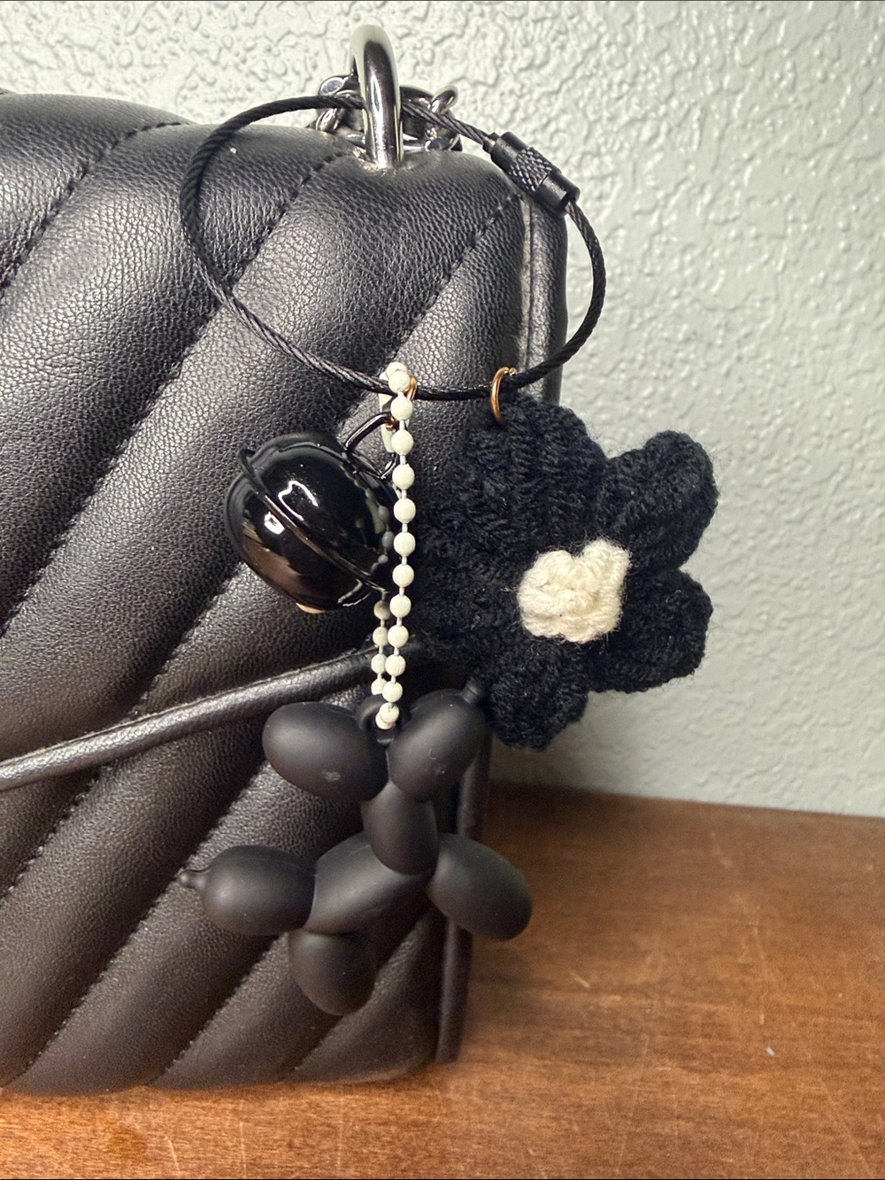 Black and White Ballon Dog Bag Charm with bell and flower